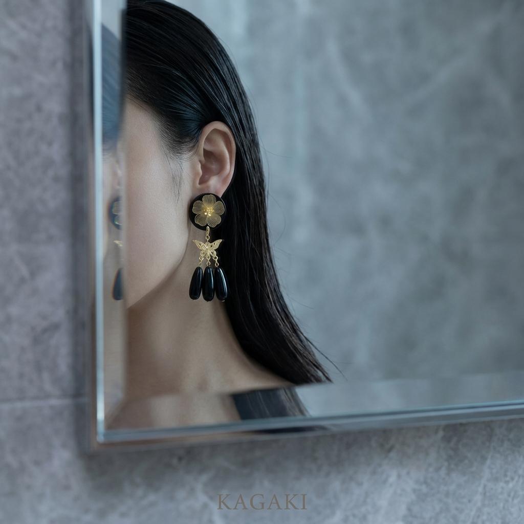 KAGAKI black gold floral butterfly earrings in black and gold, profile view, for daily wear and gifting