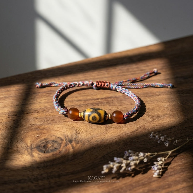 KAGAKI handmade Tibetan-inspired Dzi-style cord bracelet — Pilgrim – 旅 — styled-scene (1/11)