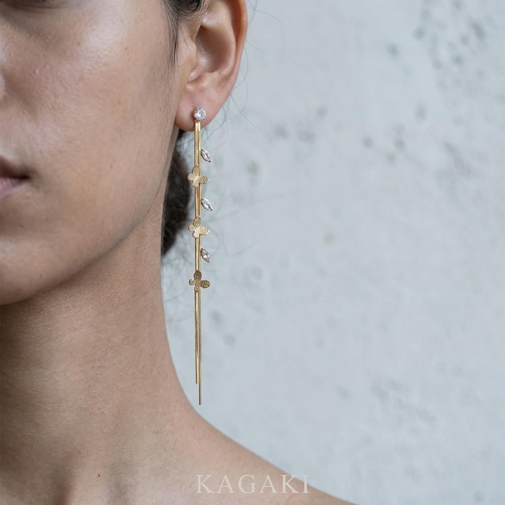 KAGAKI gold crystal drop dangle earrings in gold with crystal, flat lay, for daily wear and gifting