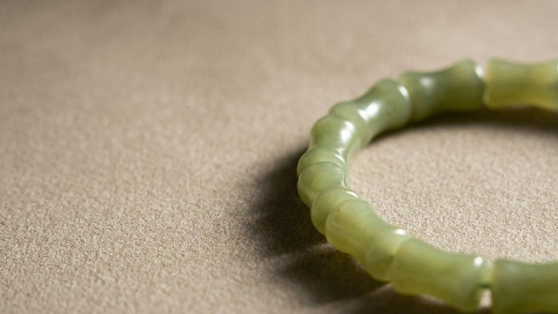 Bamboo green jade bracelet on suede — real KAGAKI product photo