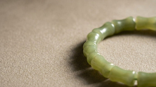 Bamboo green jade bracelet on suede — real KAGAKI product photo