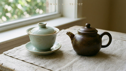 A Chinese gaiwan lidded cup compared with a small handled teapot for beginner tea brewing