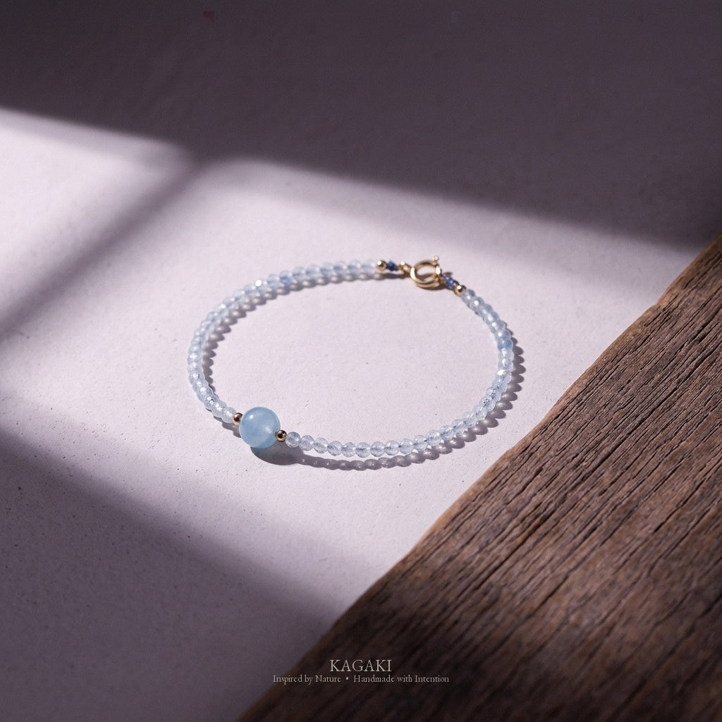 KAGAKI Brook aquamarine 14k gold bead bracelet, studio styled view, handmade aquamarine gold bracelet