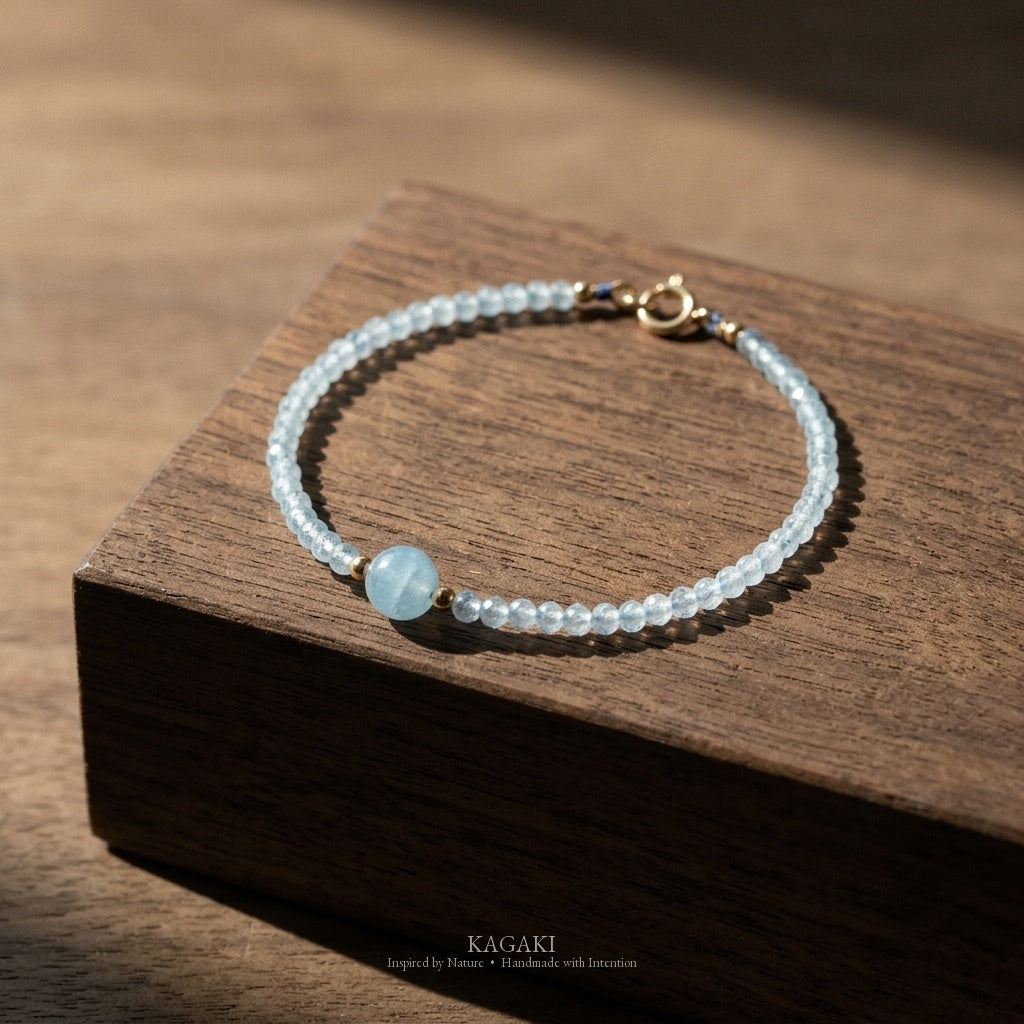 KAGAKI Brook aquamarine 14k gold bead bracelet, studio styled view, handmade aquamarine gold bracelet