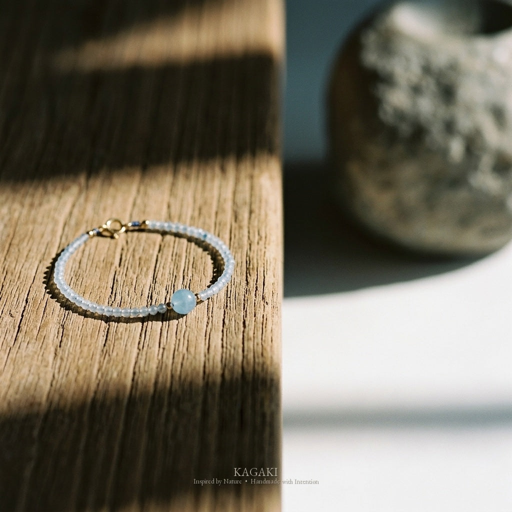 KAGAKI Brook aquamarine 14k gold bead bracelet, studio styled view, handmade aquamarine gold bracelet