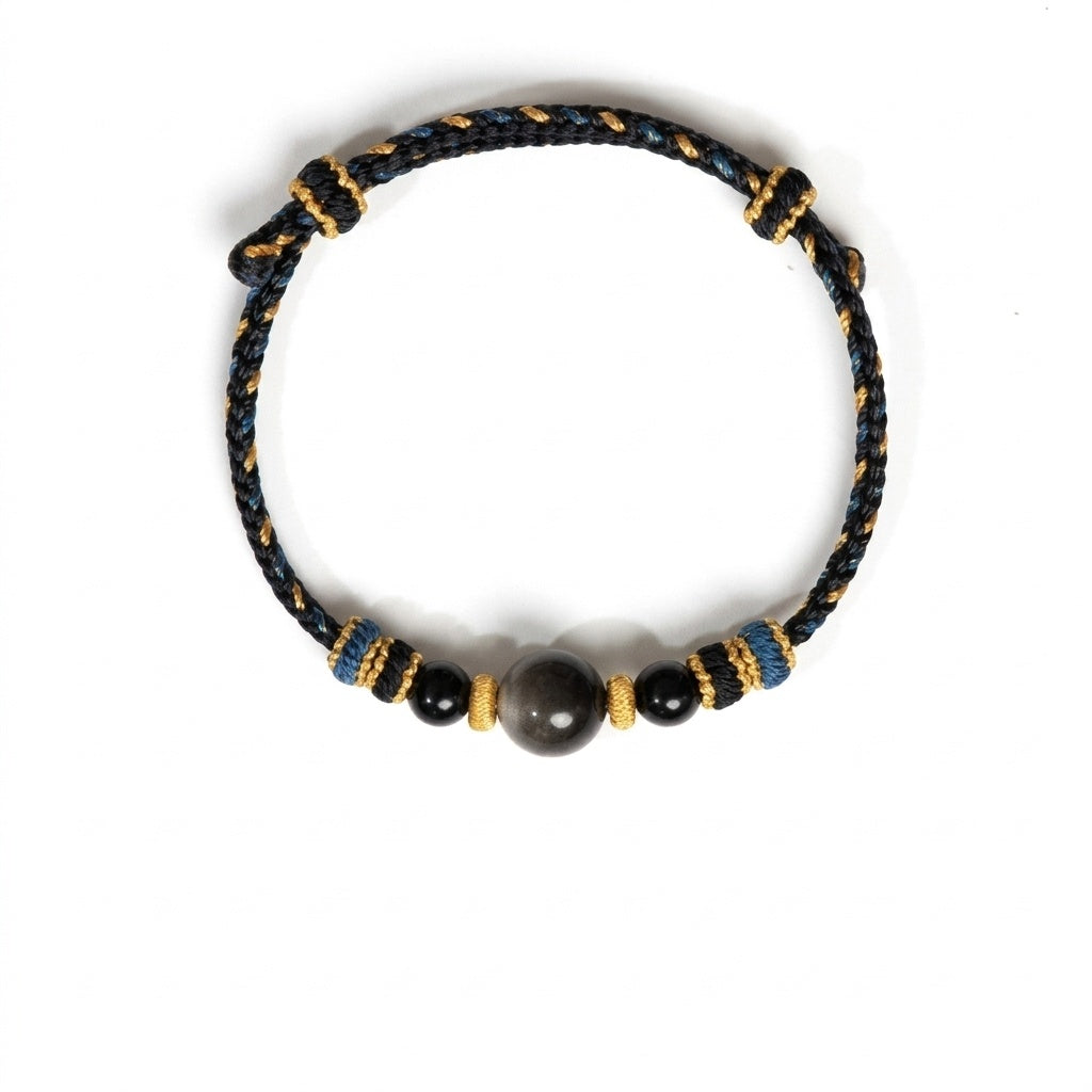 KAGAKI Ink black obsidian braided cord bracelet, white background product view, handmade black obsidian bracelet