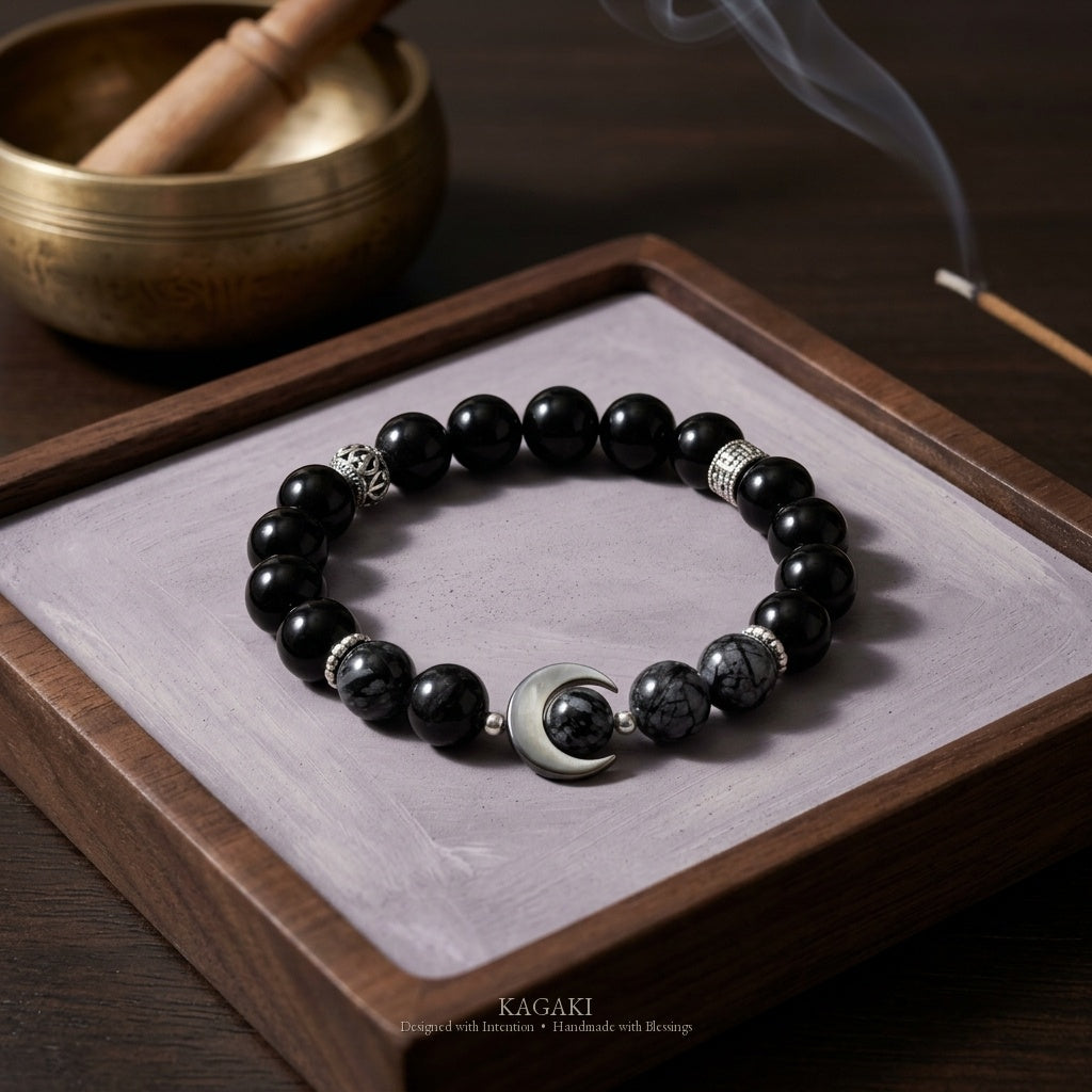 KAGAKI Nocturne black onyx silver crescent moon bracelet, studio styled view, handmade black onyx bracelet