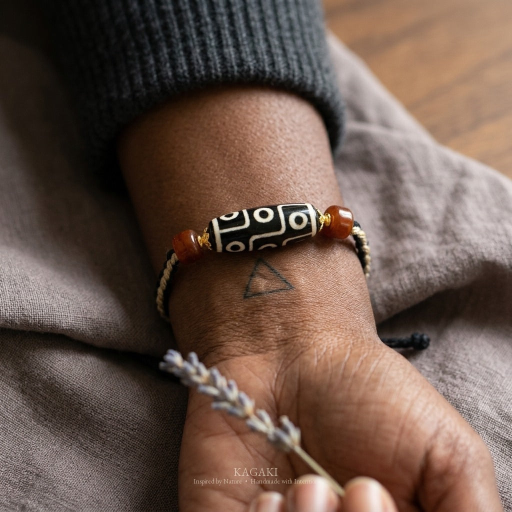 KAGAKI handmade Tibetan-inspired nine-eye Dzi-style cord bracelet — Vigil – 守 — on-wrist-lifestyle (5/11)