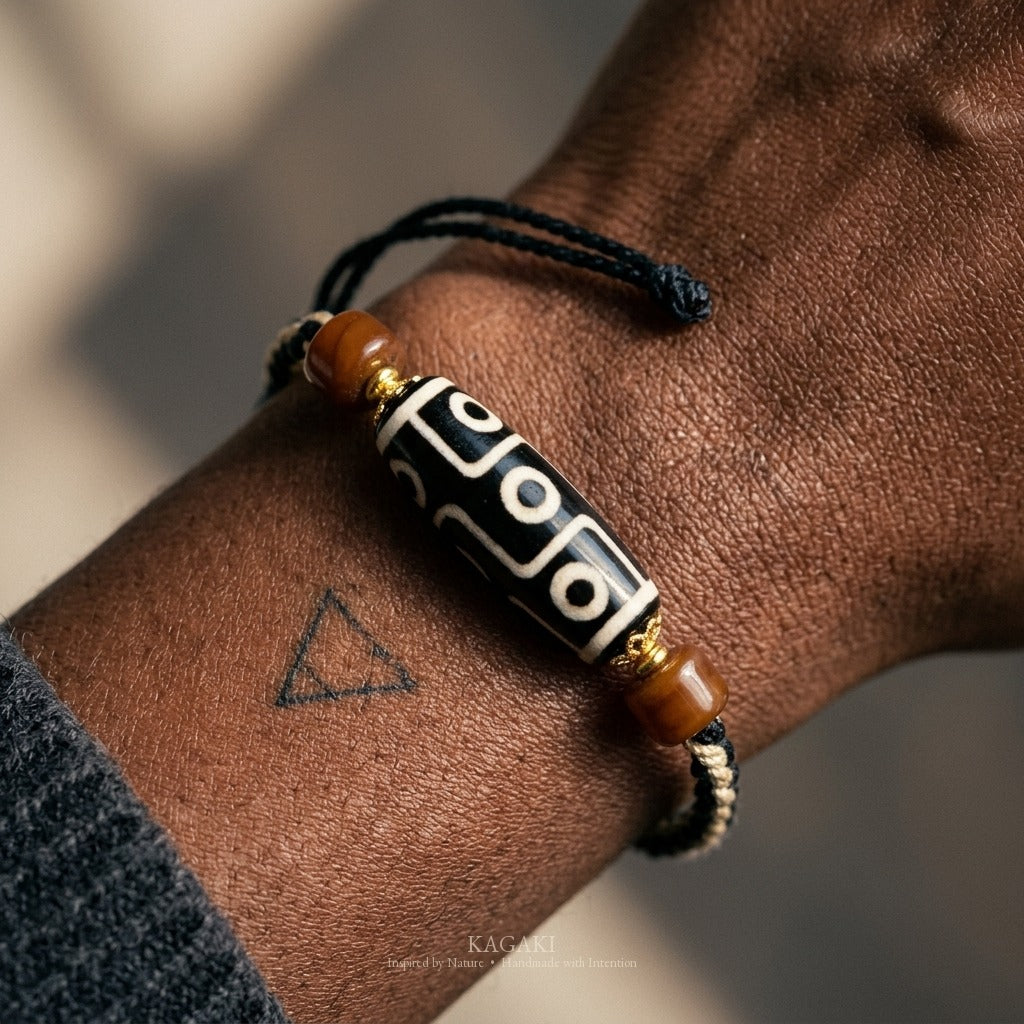 KAGAKI handmade Tibetan-inspired nine-eye Dzi-style cord bracelet — Vigil – 守 — macro detail.
