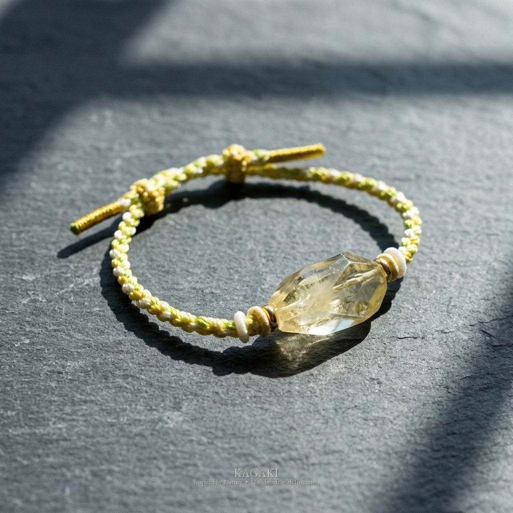 KAGAKI Honey raw citrine crystal tibetan cord bracelet, studio styled view, handmade citrine bracelet