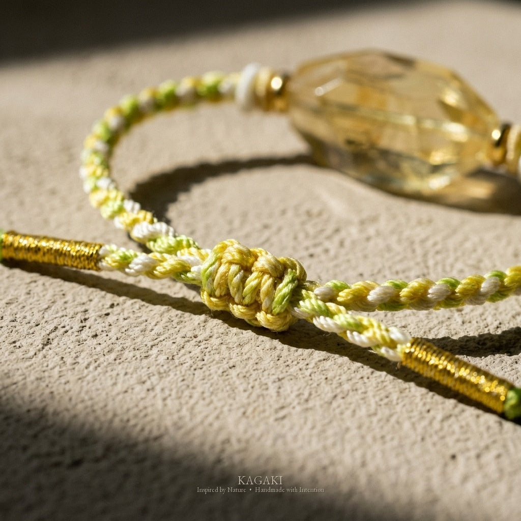 KAGAKI Honey raw citrine crystal tibetan cord bracelet, studio styled view, handmade citrine bracelet