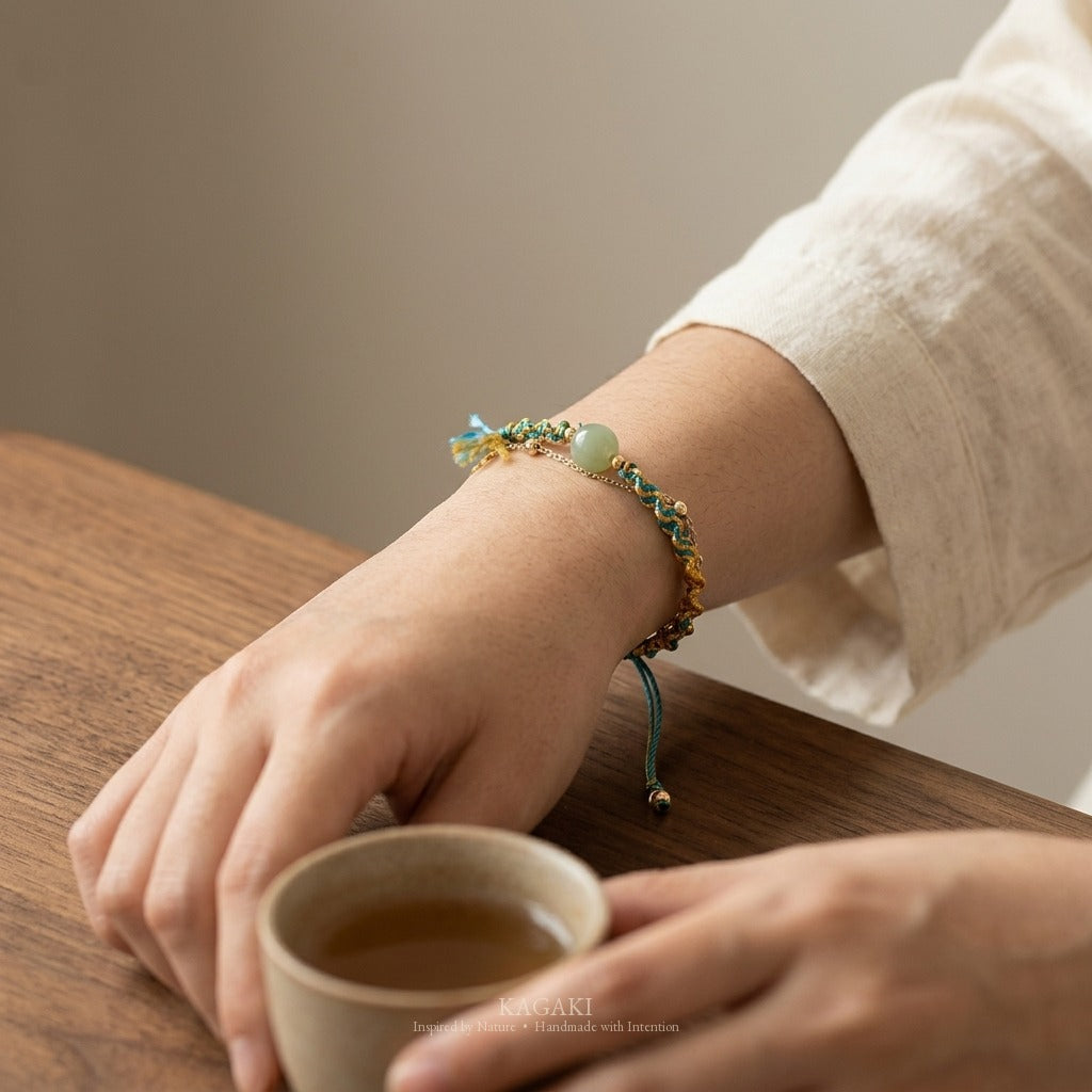 KAGAKI handmade cord bracelet double-layer jade cord bracelet — turquoise + gold + green, wrist wearing image.