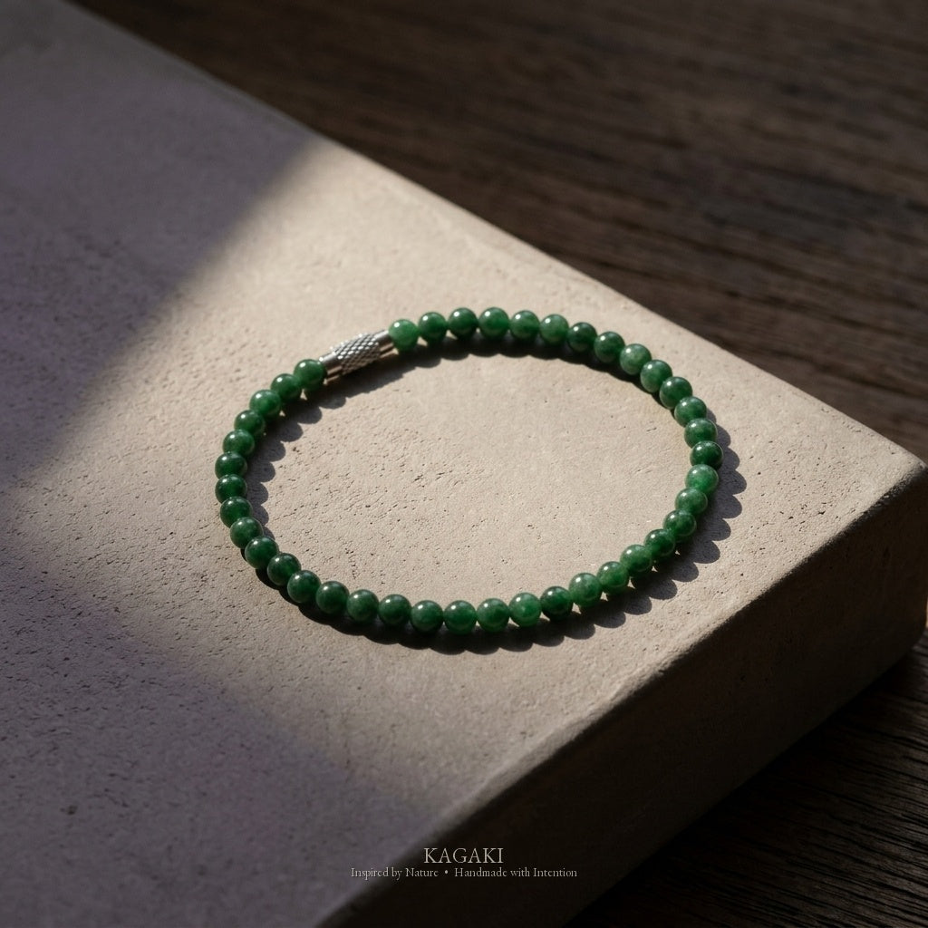 KAGAKI Juniper deep green jade fine bead bracelet, studio styled view, handmade green jade bracelet