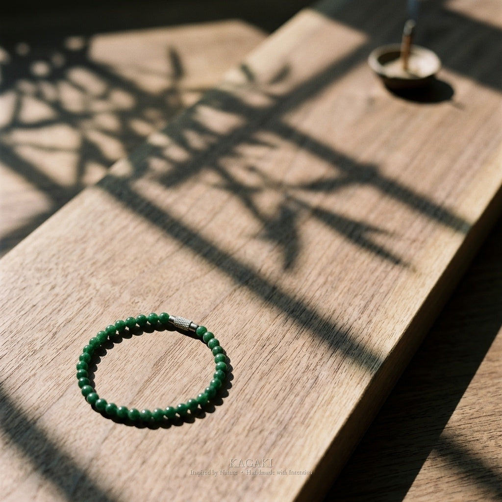 KAGAKI Juniper deep green jade fine bead bracelet, studio styled view, handmade green jade bracelet
