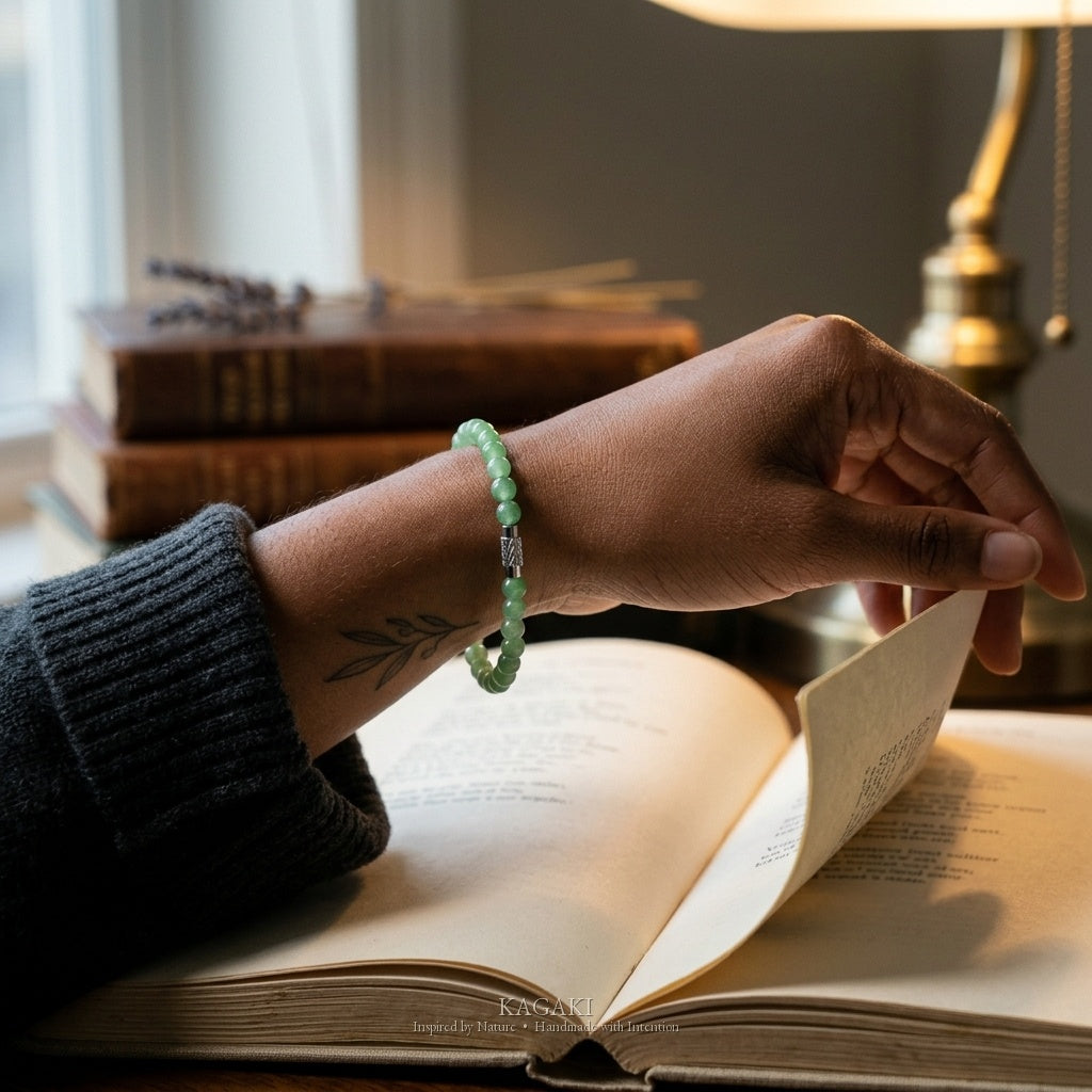 Green jade beaded bracelet worn on the wrist