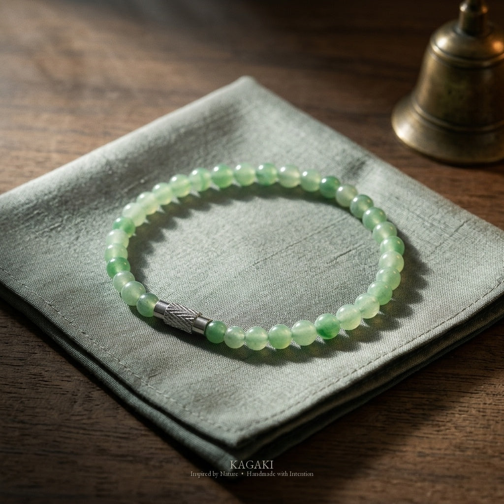 Sprout green jade beaded bracelet — floating green patterns, studio