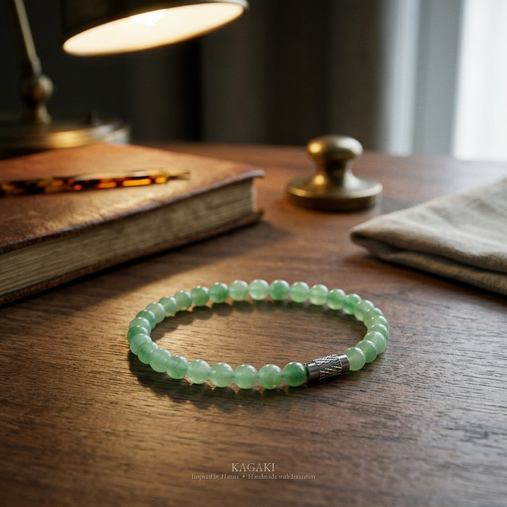Green jade beaded bracelet detail — cloud-like floating green jade