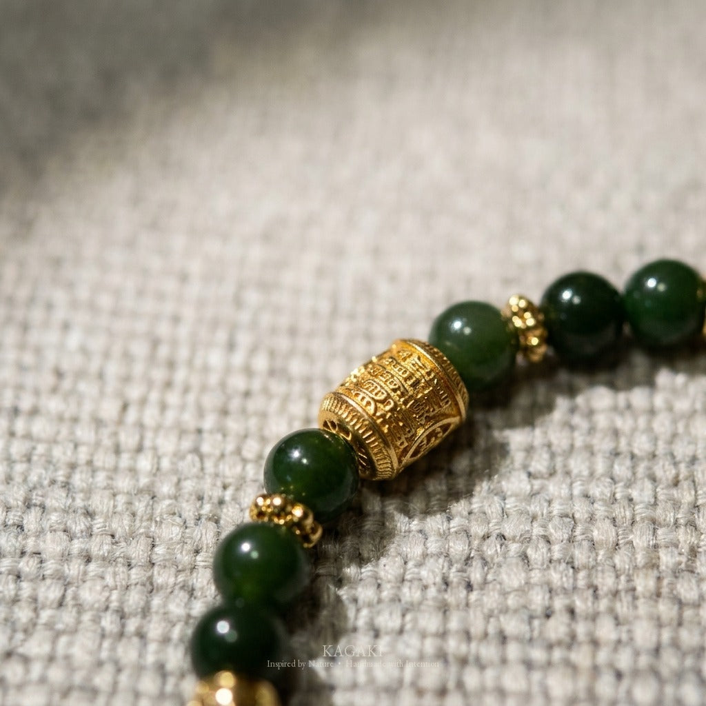 KAGAKI Scroll dark green jade carved barrel bracelet, studio styled view, handmade green jade bracelet