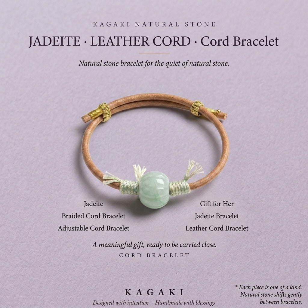 KAGAKI Canyon smooth pale green Jadeite barrel bead leather cord bracelet, green tassel wraps, gold-thread slider, editorial 