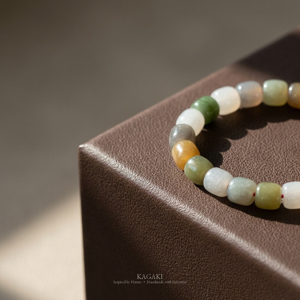 KAGAKI Pebble mixed jade barrel bead bracelet, studio styled view, handmade multicolor jade bracelet