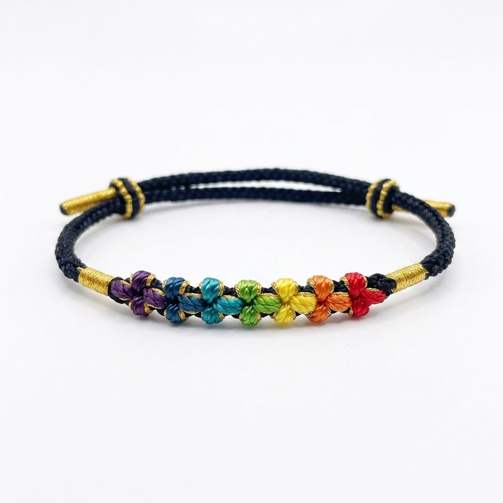 KAGAKI handmade cord bracelet rainbow sakura knot cord bracelet — black with rainbow knotted florals, main catalog image on white.