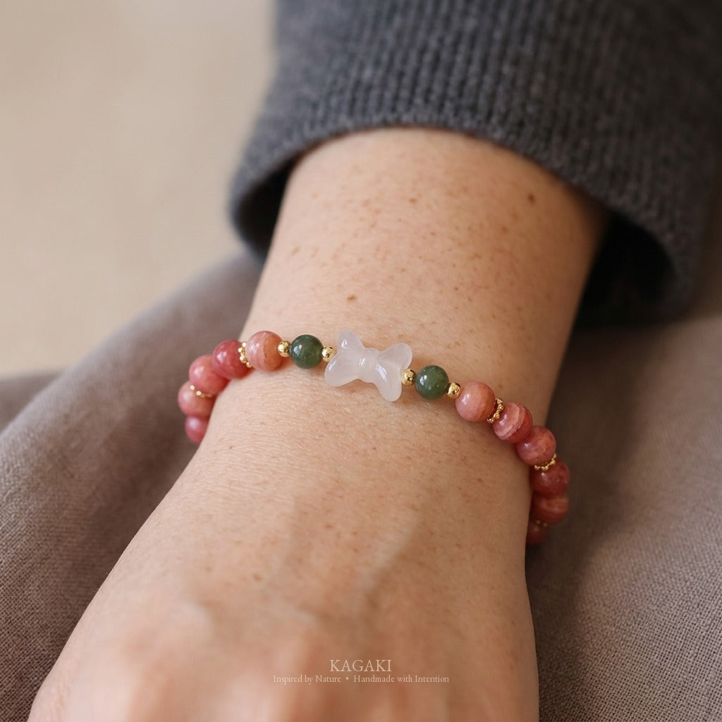 KAGAKI handmade crystal bracelet pink stone beaded bow stretch bracelet — pink + white + gold, natural lifestyle wrist detail.