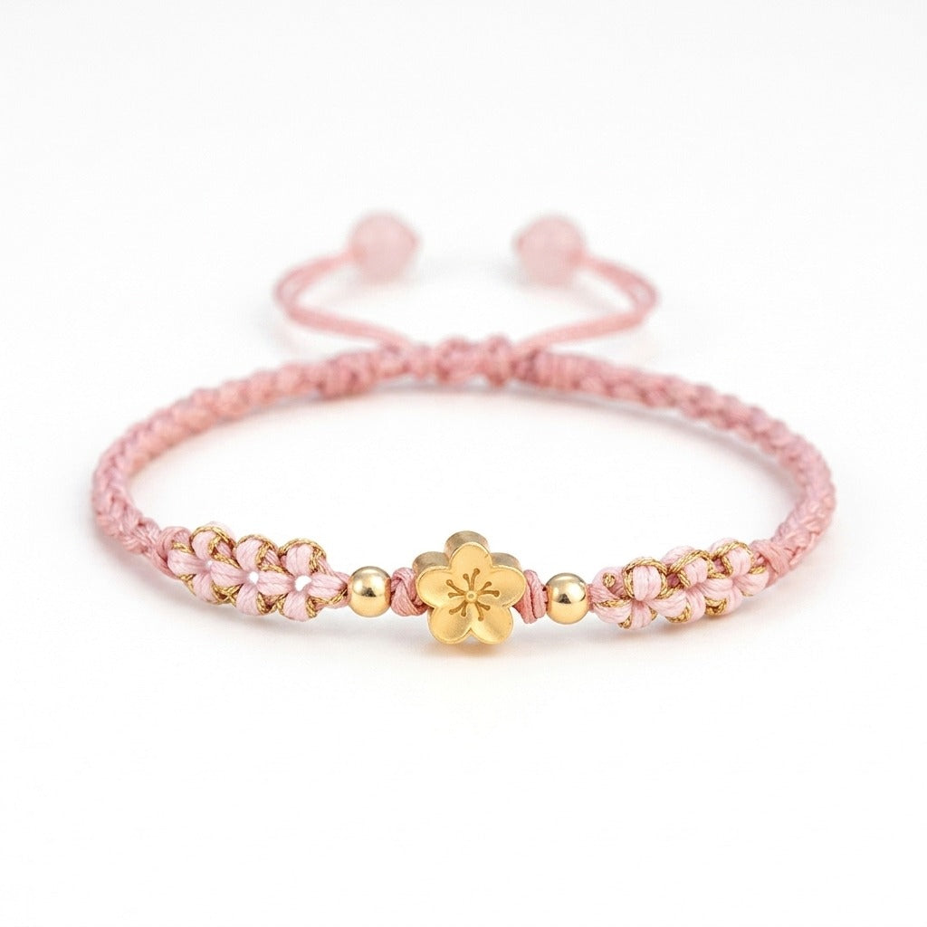 KAGAKI handmade cord bracelet sakura pastel cord bracelet (dawn & petal) — mist blue or dawn pink with gold accent, main catalog image on white.