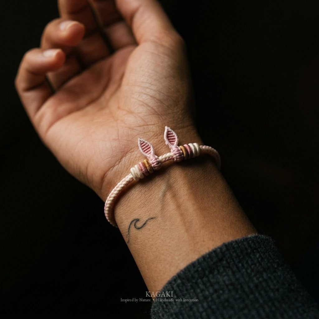 KAGAKI Bunny Knot soft pink bunny ear cord, wrist view, handmade cord bracelet gift
