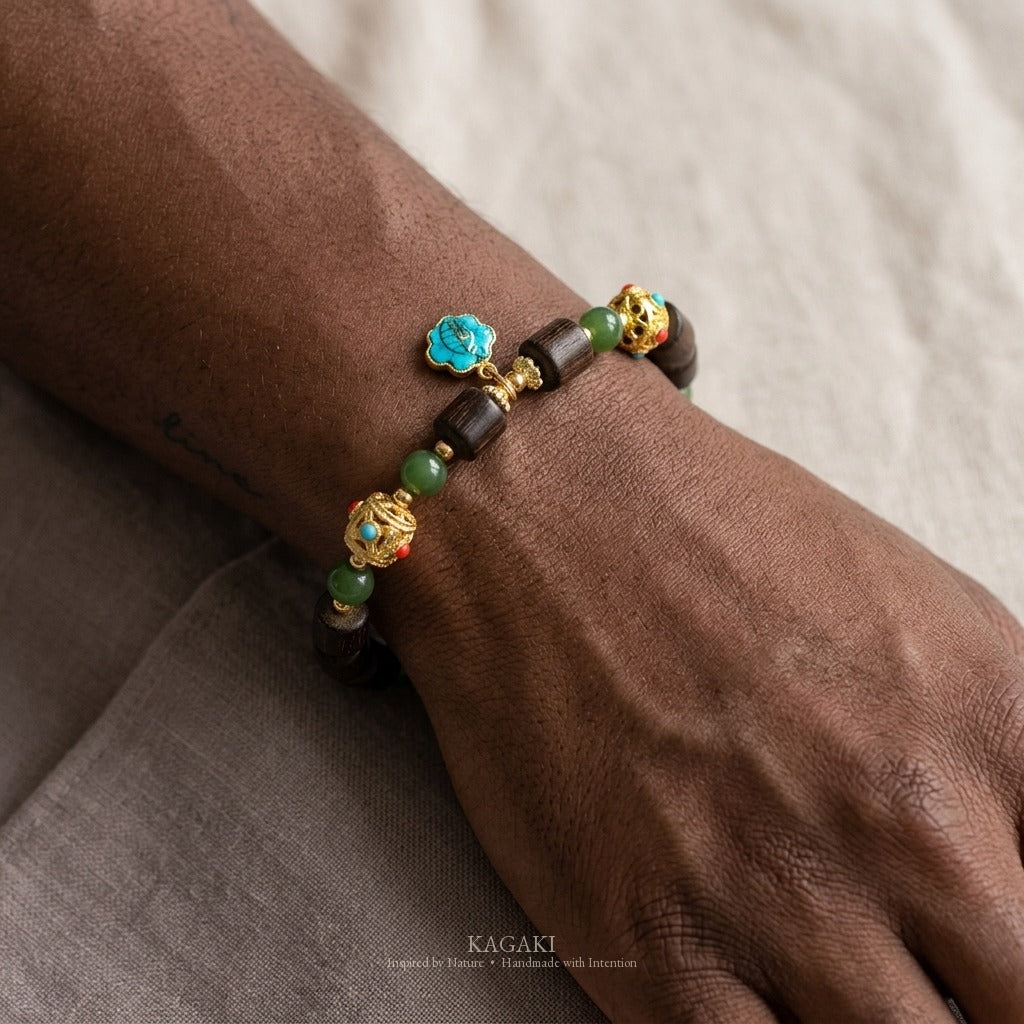KAGAKI handmade crystal bracelet tibetan jade agarwood beaded bracelet — green + dark brown + gold, natural lifestyle wrist detail.