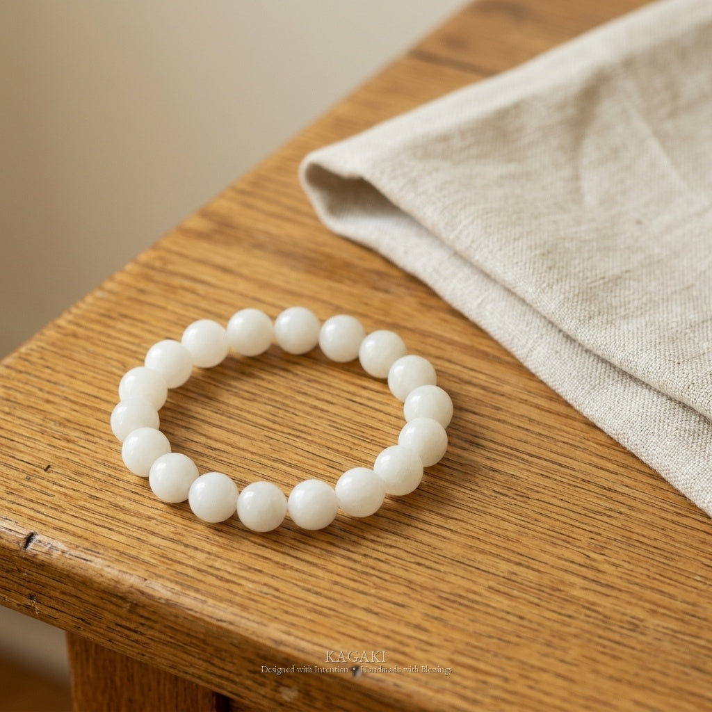 KAGAKI Snow white jade beaded stretch bracelet, studio styled view, handmade white jade bracelet