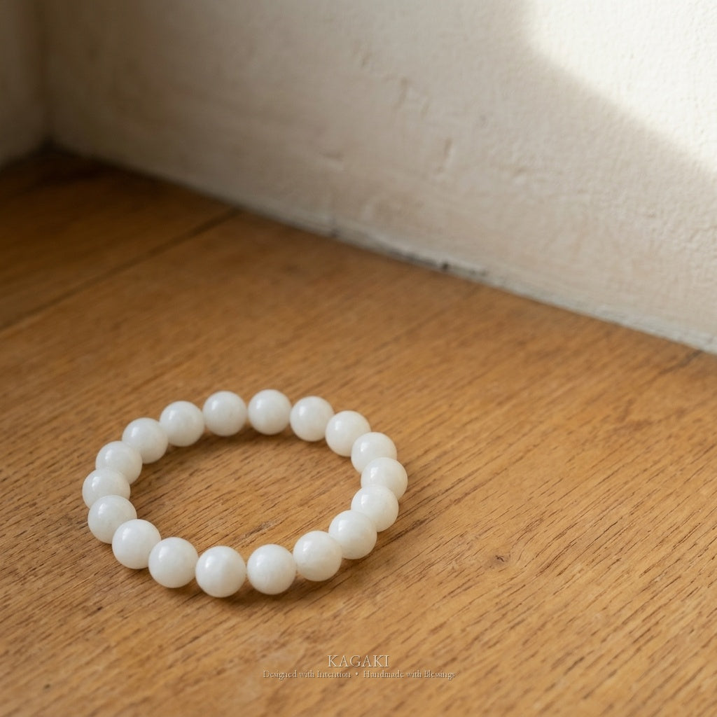KAGAKI Snow white jade beaded stretch bracelet, studio styled view, handmade white jade bracelet