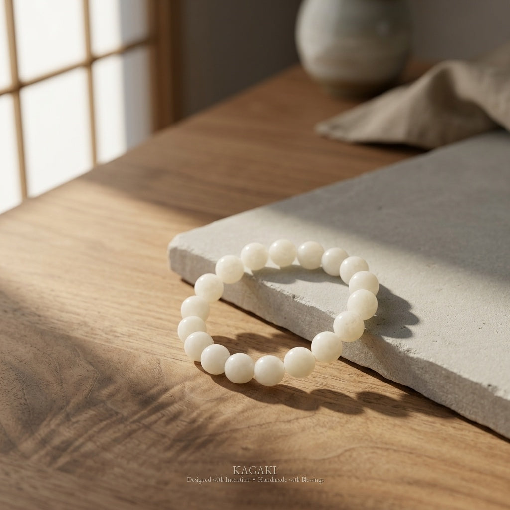 KAGAKI Snow white jade beaded stretch bracelet, studio styled view, handmade white jade bracelet