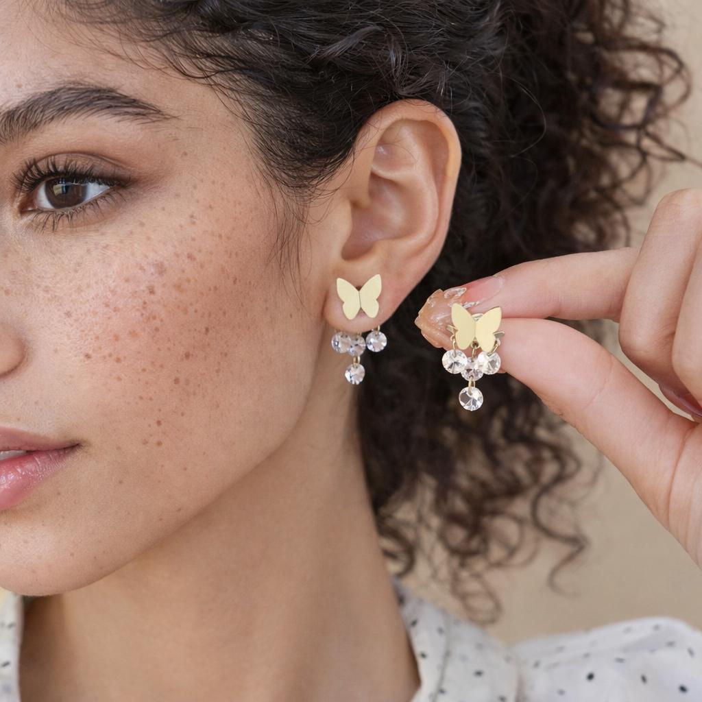KAGAKI butterfly crystal drop earrings in gold with clear crystal, alternate angle, for daily wear and gifting