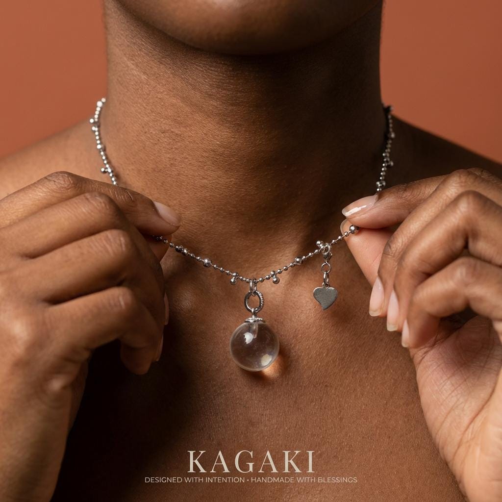 KAGAKI clear quartz crystal pendant necklace in clear quartz white sphere, profile view, for daily wear and gifting