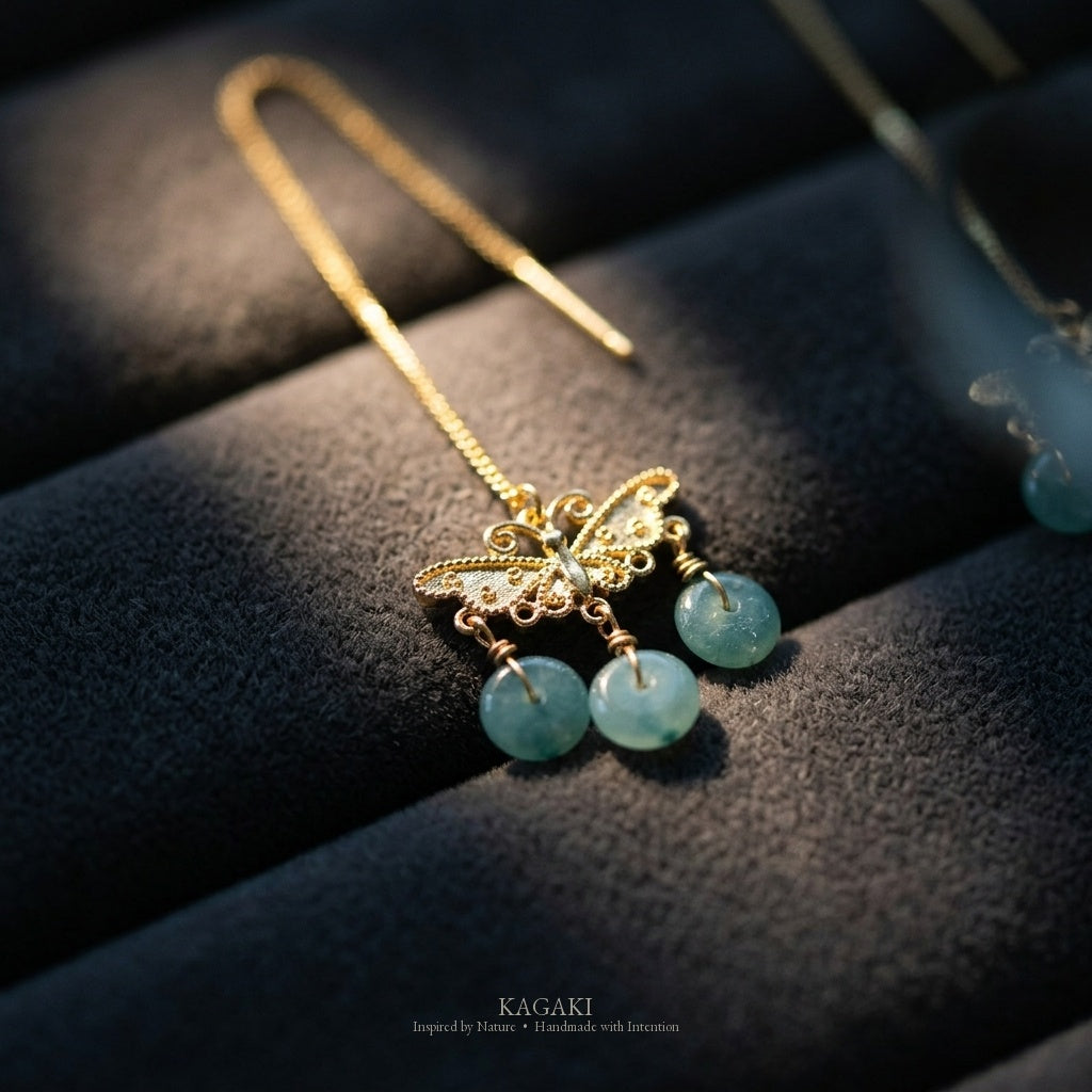 KAGAKI Monarch gold butterfly blue jadeite earrings, studio styled view, handmade butterfly earrings gold