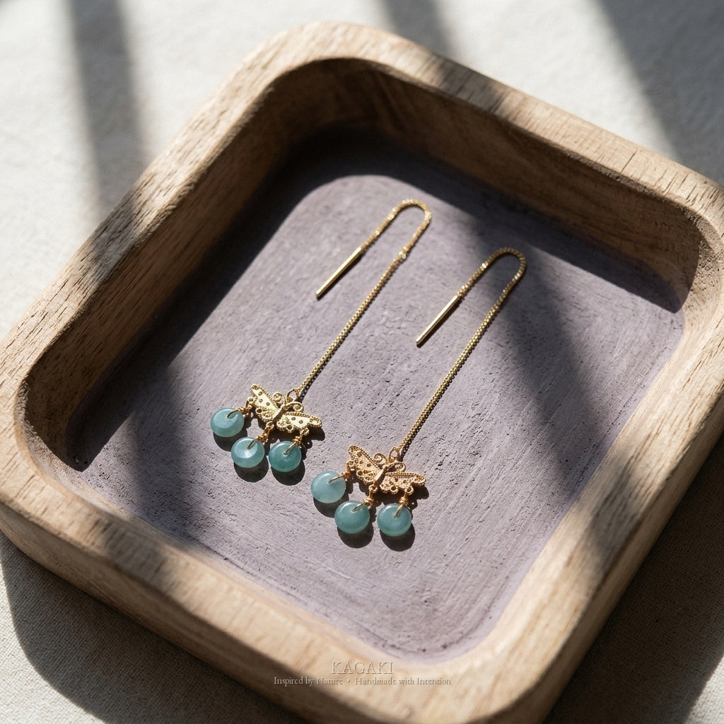KAGAKI Monarch gold butterfly blue jadeite earrings, studio styled view, handmade butterfly earrings gold