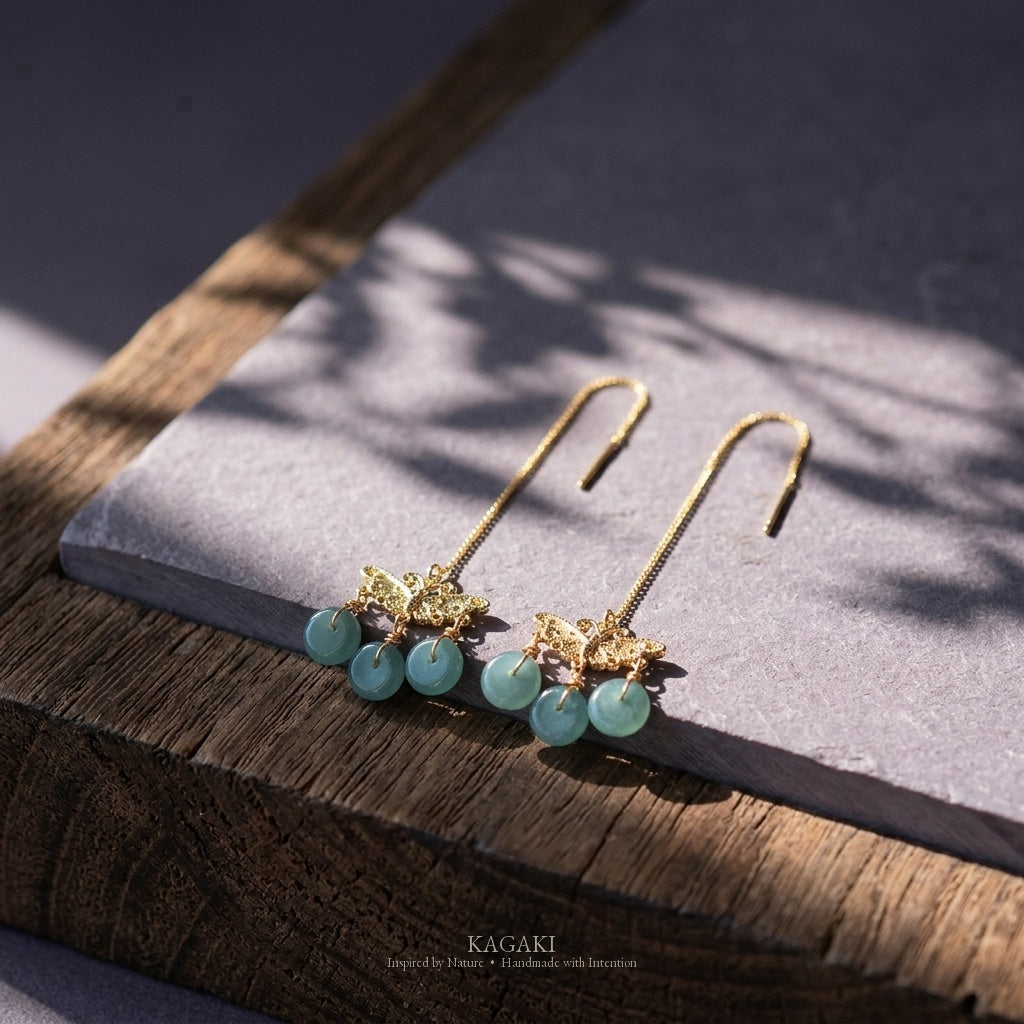 KAGAKI Monarch gold butterfly blue jadeite earrings, studio styled view, handmade butterfly earrings gold