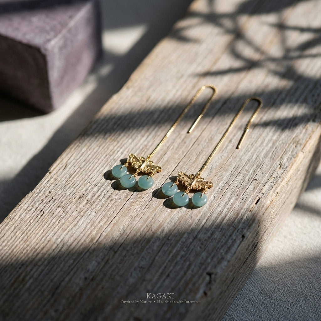 KAGAKI Monarch gold butterfly blue jadeite earrings, studio styled view, handmade butterfly earrings gold