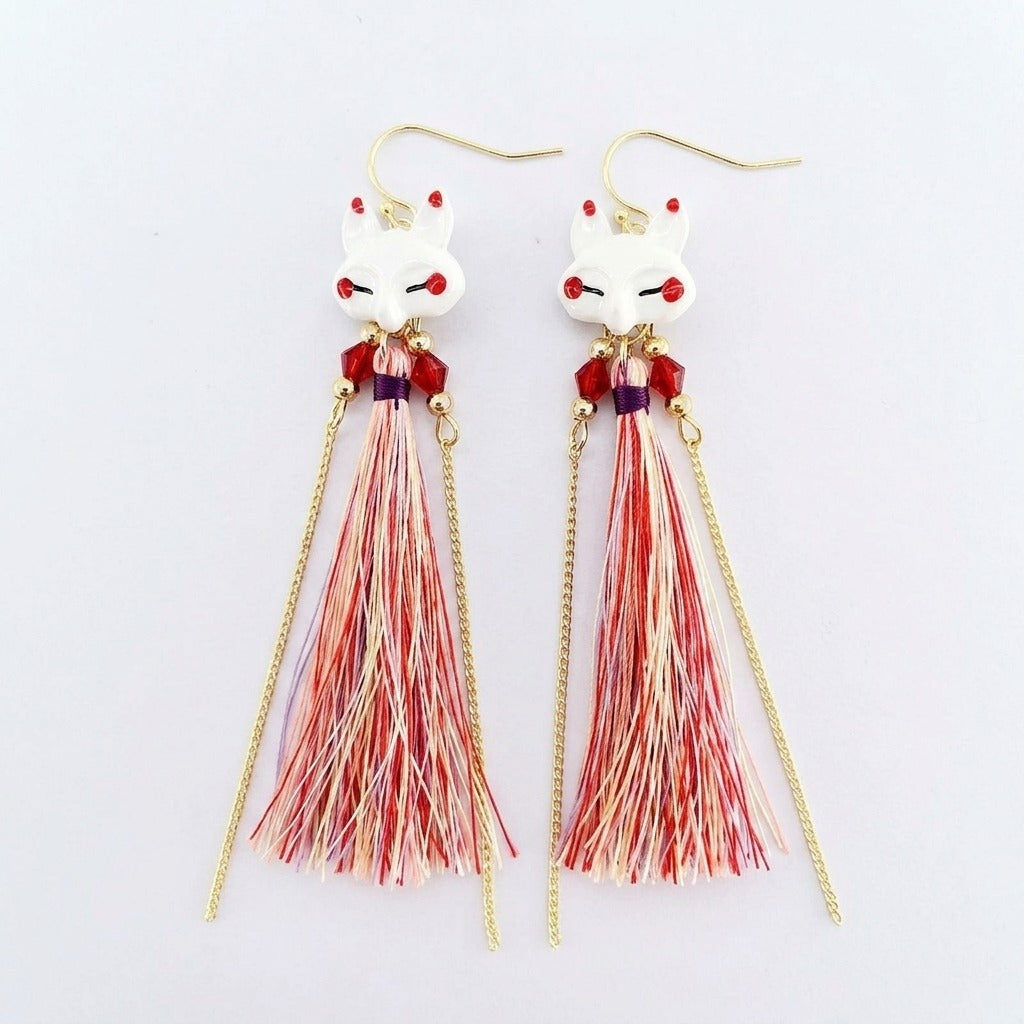 KAGAKI Japanese kitsune fox earrings in white porcelain with fine fiber tassel, shown as primary product image, suitable for spiritual jewelry and Japanese-inspired daily wear