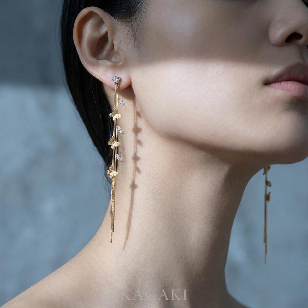 KAGAKI gold crystal drop dangle earrings in gold with crystal, on ear, for daily wear and gifting