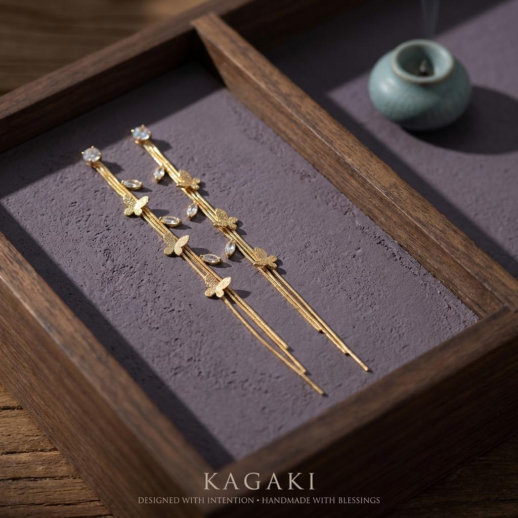 KAGAKI gold crystal drop dangle earrings in gold with crystal, profile view, for daily wear and gifting