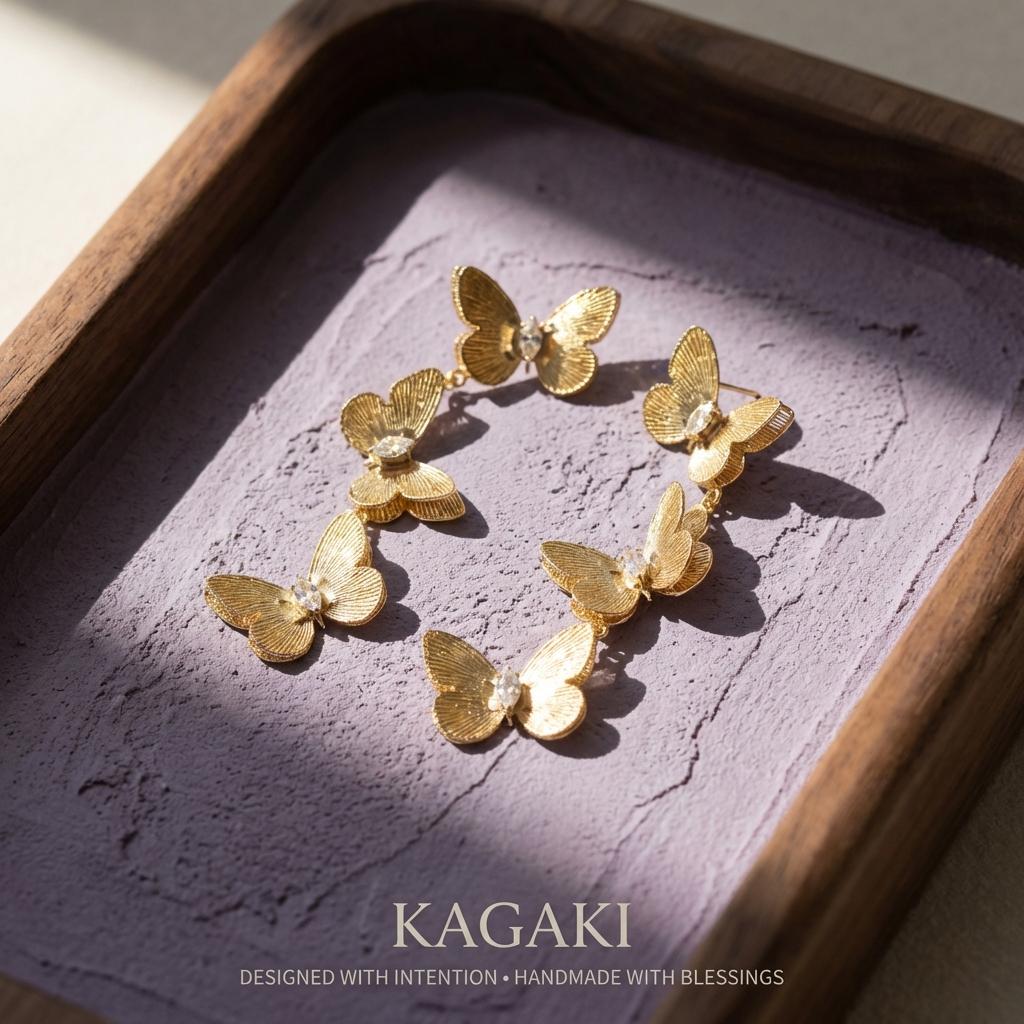 KAGAKI golden butterfly drop earrings in gold, on ear, for daily wear and gifting