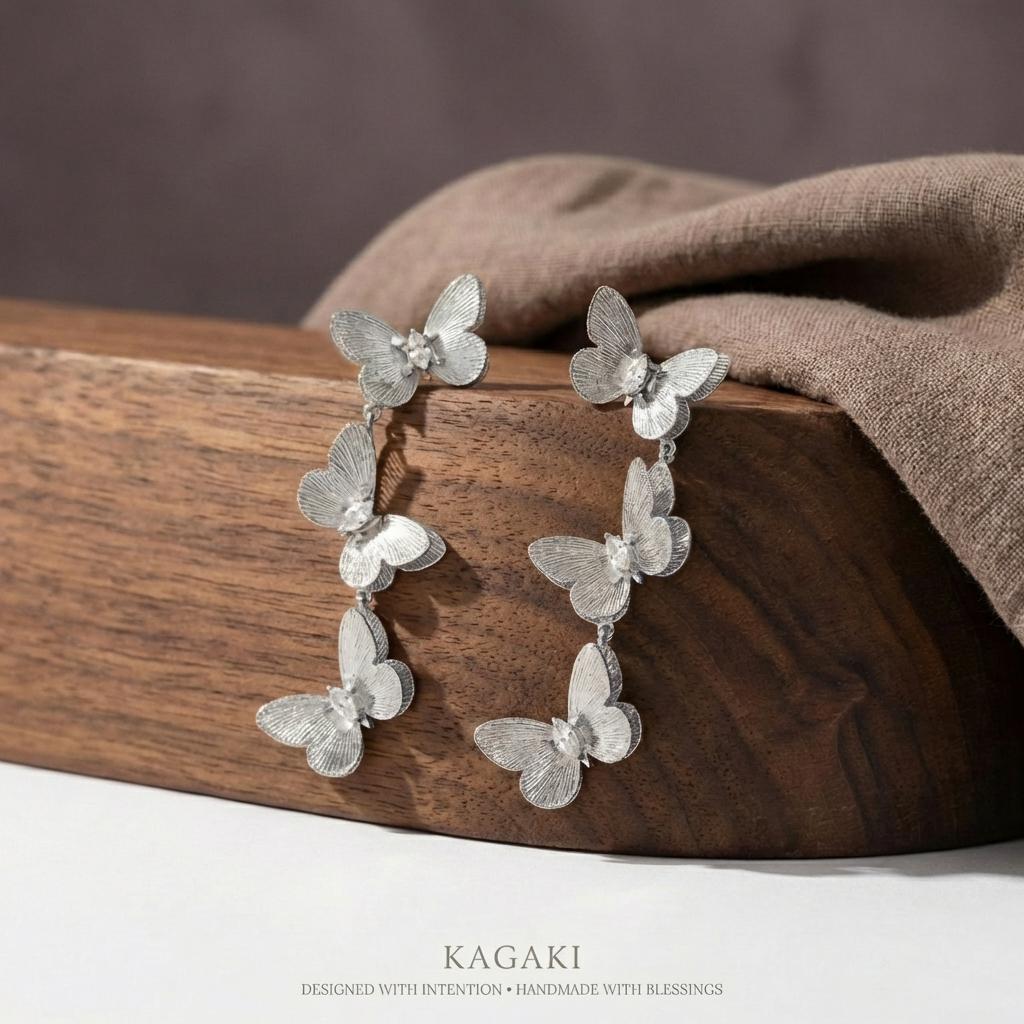 KAGAKI golden butterfly drop earrings in gold, profile view, for daily wear and gifting