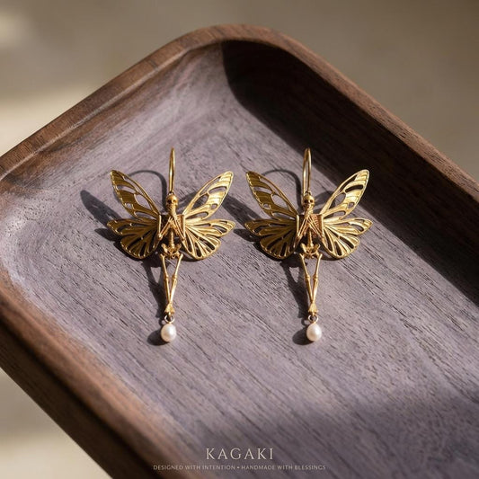 KAGAKI gothic butterfly skull earrings in gold, pearl, dark accents, main, for daily wear and gifting