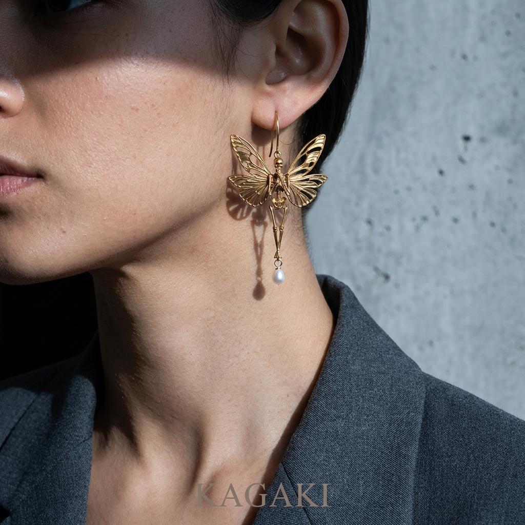 KAGAKI gothic butterfly skull earrings in gold, pearl, dark accents, profile view, for daily wear and gifting