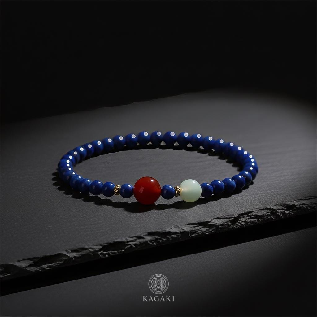 KAGAKI lapis lazuli beaded bracelet in deep blue lapis with red agate and white jade, packaging detail, for meditation and daily intention