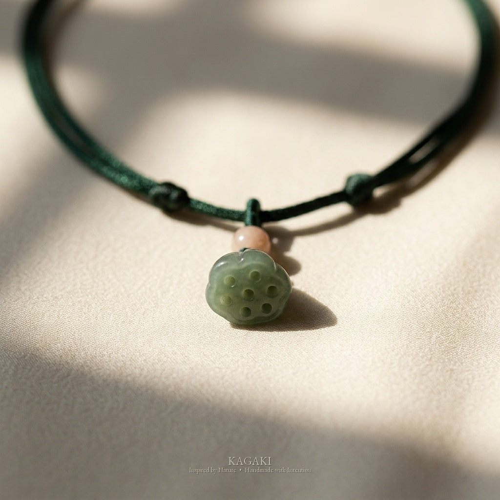 KAGAKI Heron jade lotus pod cord choker, studio styled view, handmade jade choker