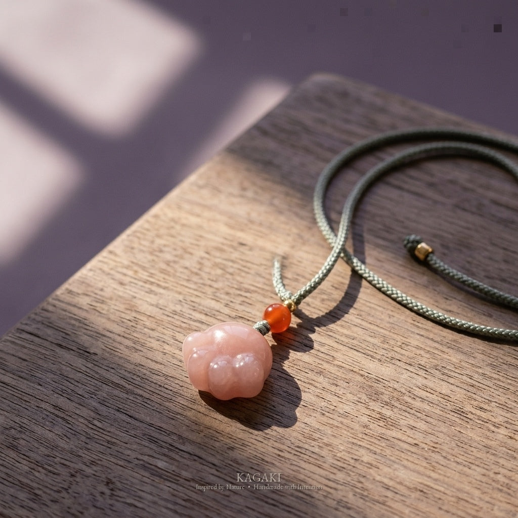 KAGAKI Paw pink jade cat paw pendant necklace, studio styled view, handmade cat necklace