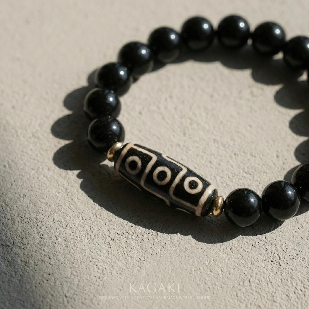 KAGAKI obsidian dzi bead bracelet in deep black obsidian, alternate angle, for meditation and daily intention