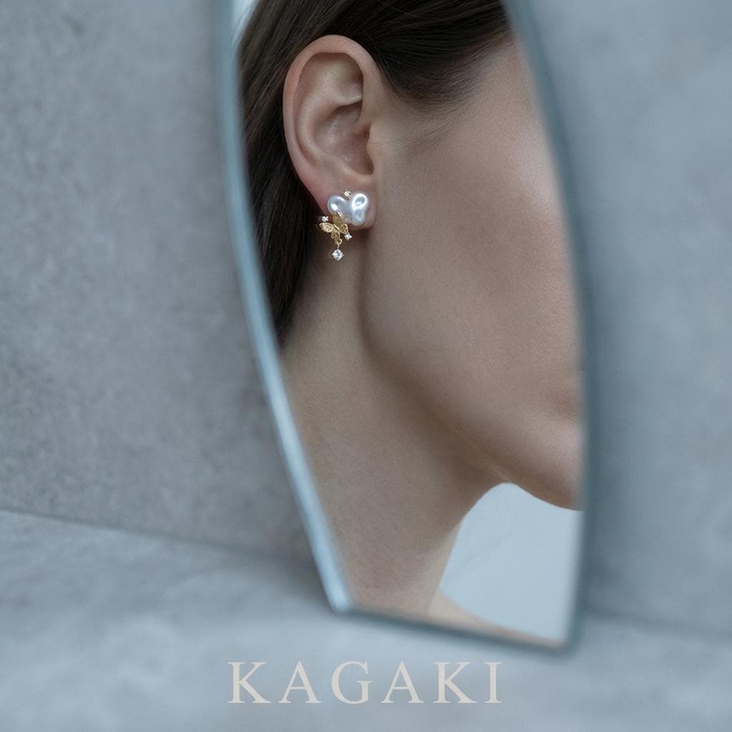KAGAKI pearl butterfly stud earrings in gold and pearl, on ear, for daily wear and gifting